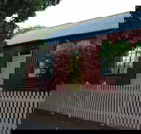 Portable Iron Houses - Kawana Tourism