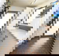 Ned Kelly's Retreat - Sophisticated style with modern convenience and magical outlook - Kawana Tourism