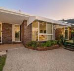 Woorim Secluded Palms Cottage - Kawana Tourism