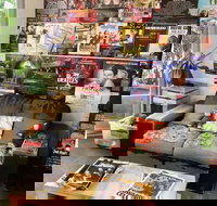 Brown Cardigan - Kawana Tourism