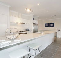 Penguin 4 Bedroom House by Shoalwater Executive Homes - Kawana Tourism