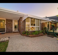 Woorim Secluded Palms Cottage - Kawana Tourism