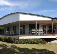14 Zircon Street - Centrally located family home with covered deck close to patrolled beach  shops - Kawana Tourism