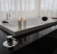 Aurora Cottages Bush Retreat - Kawana Tourism